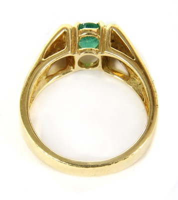 Lot 45 - An 18ct gold emerald and diamond ring