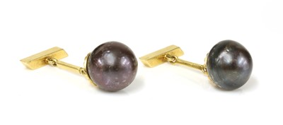 Lot 219 - A pair of single stone cultured South Sea pearl cufflinks