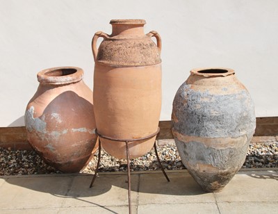 Lot 557 - Three various oil jars