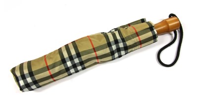 Lot 222 - A chequered Burberry umbrella