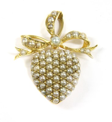 Lot 80 - A Victorian gold split pearl heart pendant