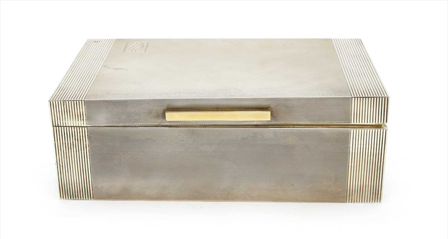Lot 172 - A large cedarwood lined silver cigarette box
