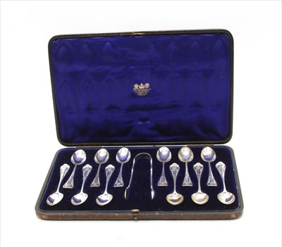 Lot 136 - A cased set of silver spoons and tongs