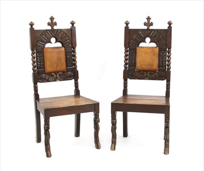 Lot 530 - A pair of carved oak standard chairs