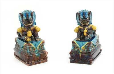 Lot 379 - A pair of 20th century Chinese temple lions