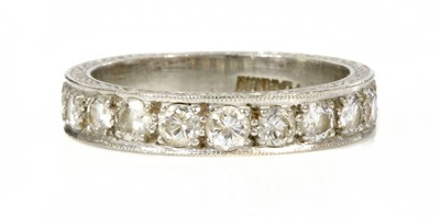 Lot 194 - A platinum diamond set half eternity ring