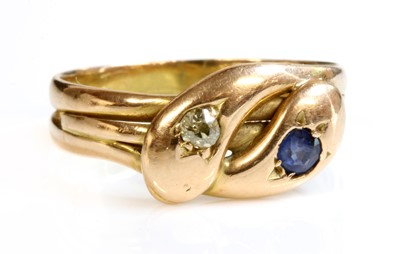 Lot 491 - A Victorian 15ct gold sapphire and diamond twin snake ring