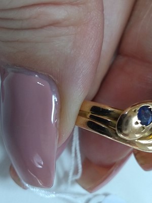 Lot 491 - A Victorian 15ct gold sapphire and diamond twin snake ring