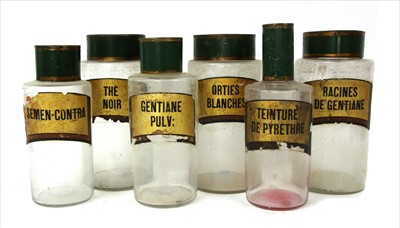 Lot 268 - Six glass and labelled apothecaries bottles