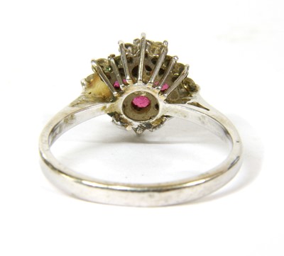 Lot 50 - An 18ct white gold diamond and ruby cluster ring