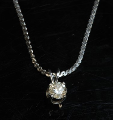 Lot 307 - A white gold single stone treated diamond pendant