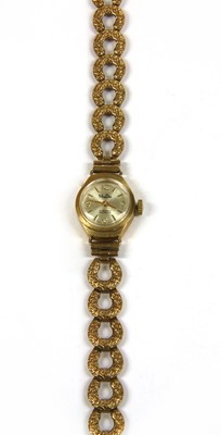 Lot 169 - A ladies' 9ct gold Mudu mechanical bracelet watch