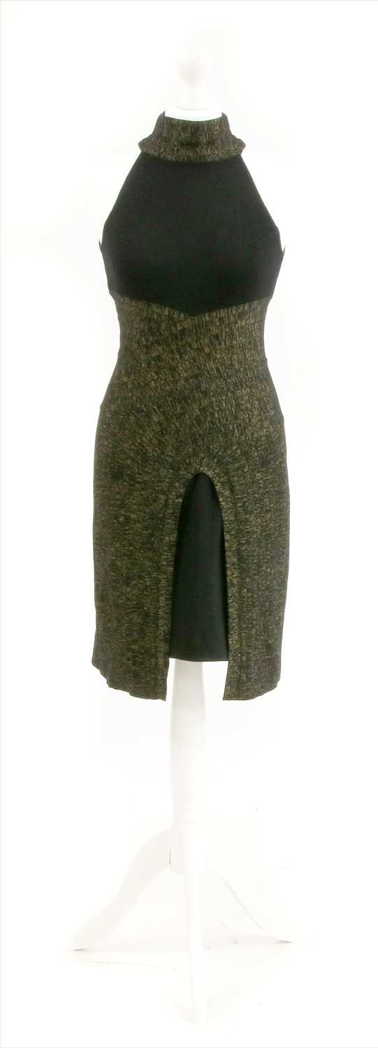 Lot 227 - A Chanel black and gold knitted dress