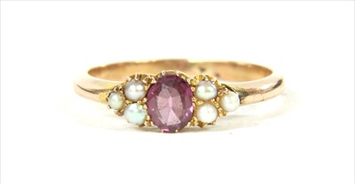 Lot 14 - A gold garnet and split pearl ring