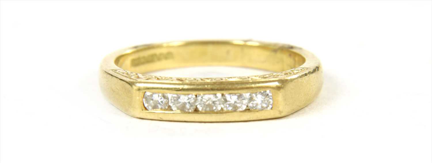 Lot 69 - An 18ct gold five stone diamond ring