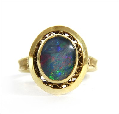 Lot 71 - A gold opal triplet ring