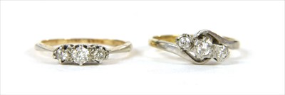 Lot 30 - An 18ct gold three stone diamond ring