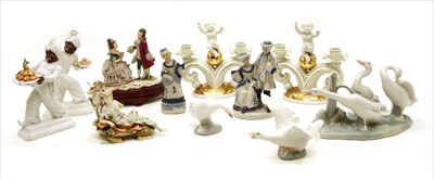 Lot 292 - A collection of ceramic figures