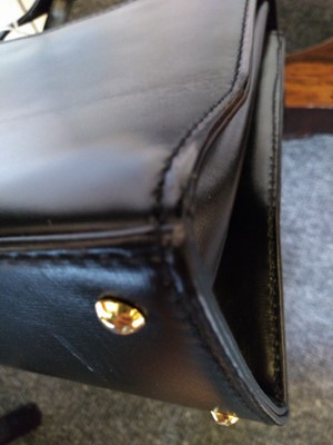 Lot 1013 - A Launer black leather handbag
