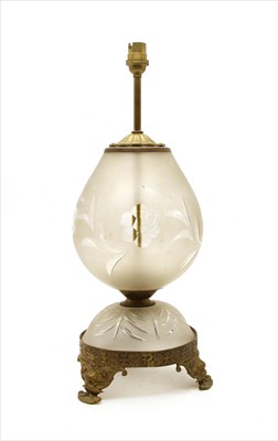 Lot 208 - An etched glass and gilt metal table lamp