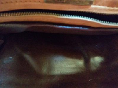 Lot 1019 - A Bottega Veneta tan intrecciato leather clutch bag