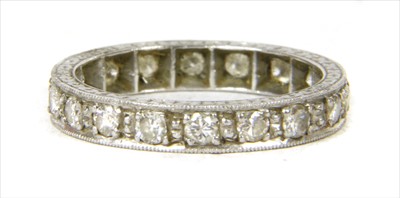 Lot 27 - A platinum diamond full eternity ring
