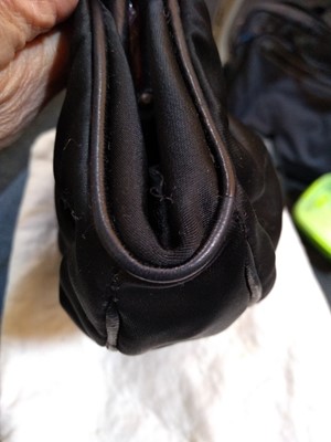 Lot 262 - A vintage Chanel black satin evening bag, c.1980