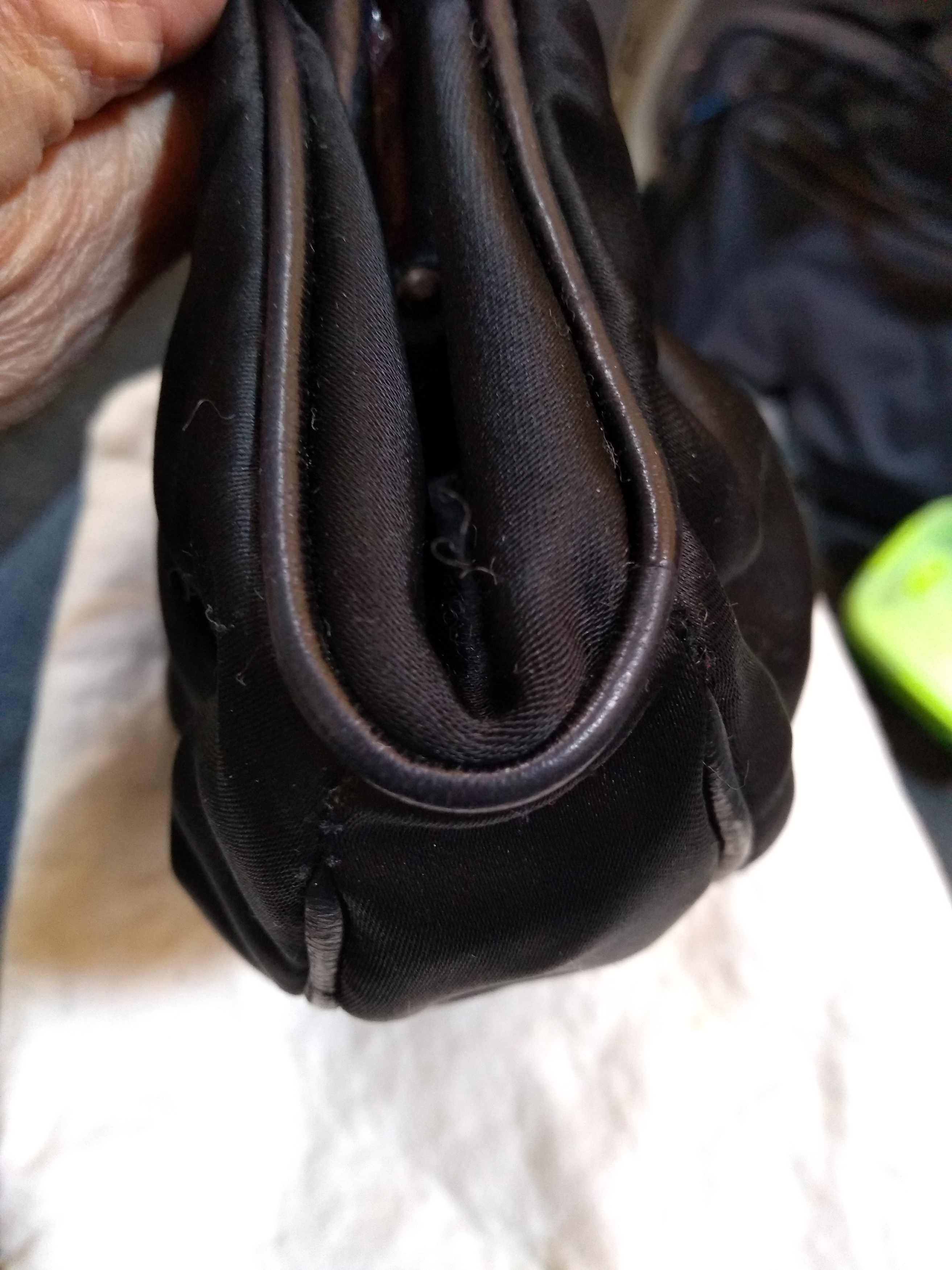 Lot 262 - A vintage Chanel black satin evening bag