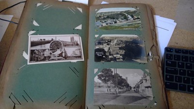 Lot 248 - Two Victorian and later postcard  and one photo album