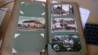 Lot 248 - Two Victorian and later postcard  and one photo album