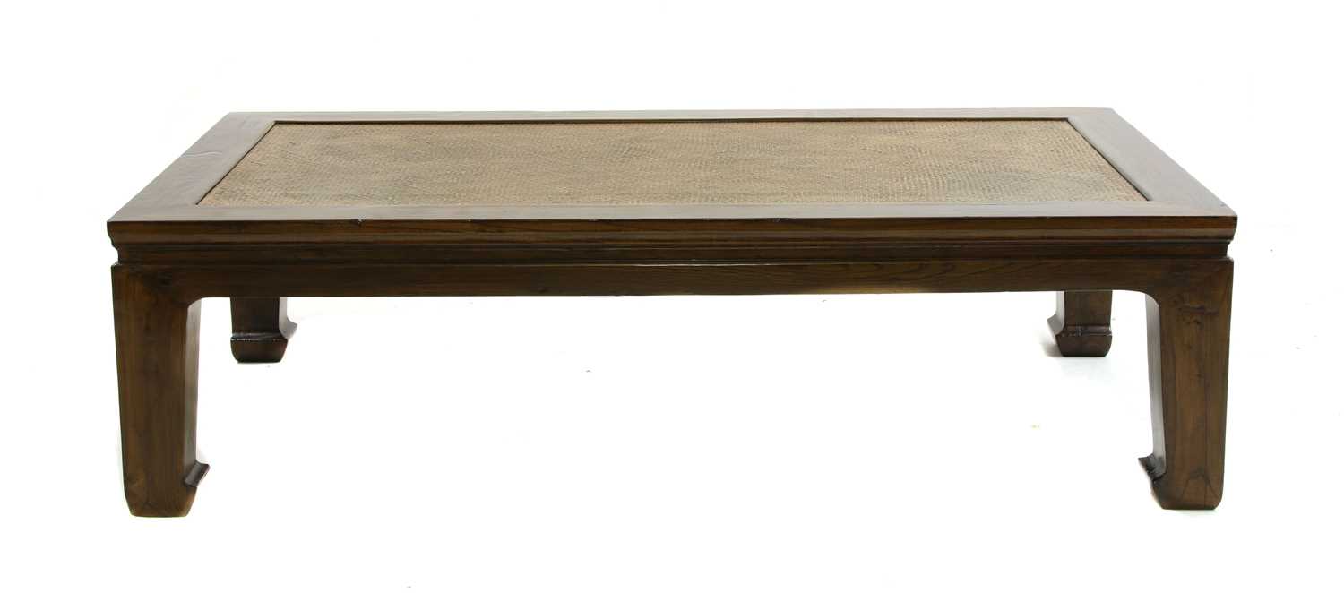 Lot 114 - A Chinese elm wood coffee table
