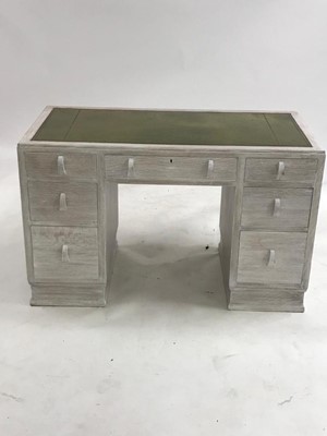 Lot 382 - A limed oak desk