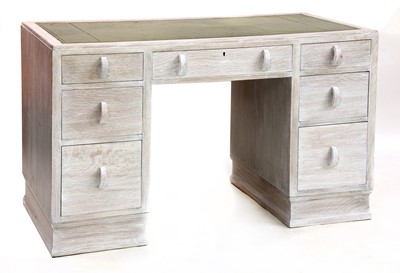 Lot 382 - A limed oak desk