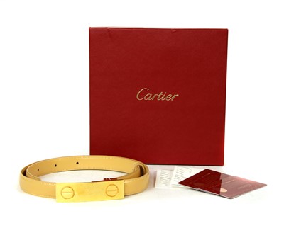 Lot 247 - A Cartier beige leather 'Love' belt