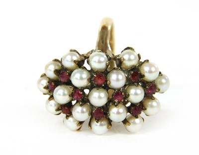 Lot 68 - A gold cultured pearl and ruby cluster ring