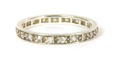 Lot 32 - A white gold diamond full eternity ring