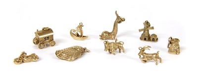 Lot 78 - A quantity of gold charms