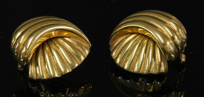Lot 180 - A pair of 18ct gold gadroon shell form earrings
