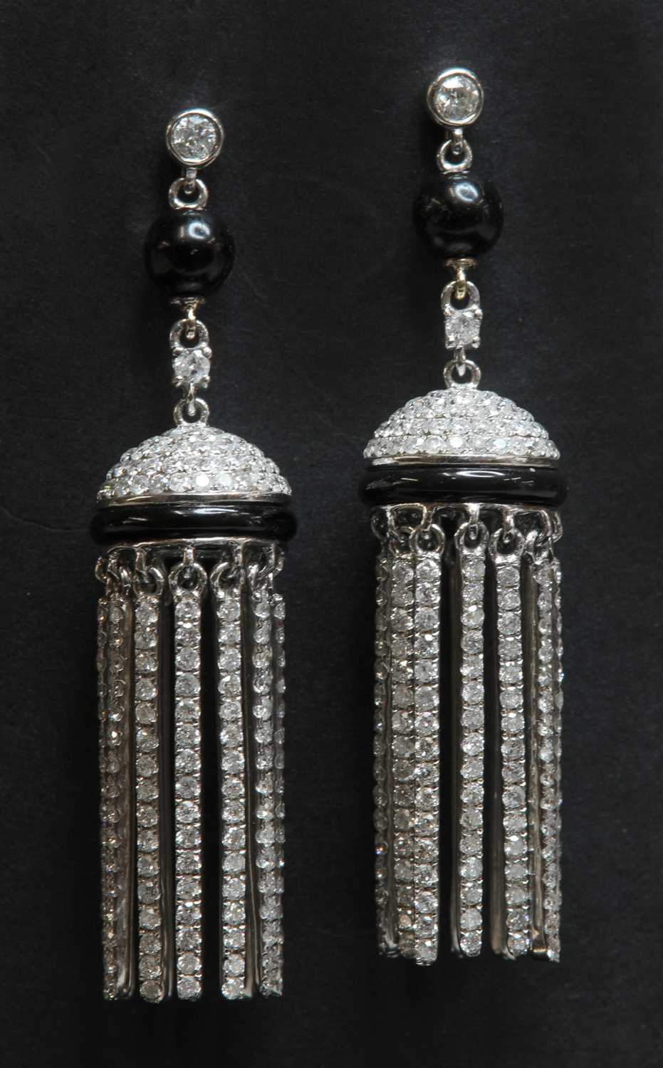 Lot 301 - A pair of Art Deco-style white gold, black glass and diamond tassel earrings