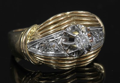 Lot 147 - A French gold diamond bombé ring, c.1940