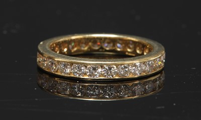 Lot 298 - A diamond set full eternity ring