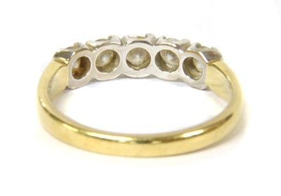 Lot 81 - An 18ct gold five stone diamond ring