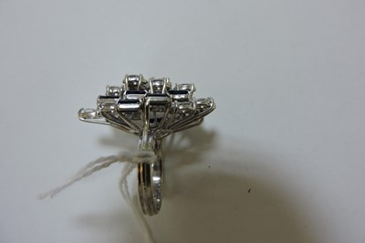 Lot 195 - A white gold diamond and sapphire marquise-shaped cluster ring