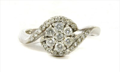 Lot 70 - A white gold diamond cluster ring