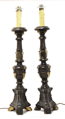 Lot 119 - A pair of Continental giltwood and painted altar candlesticks