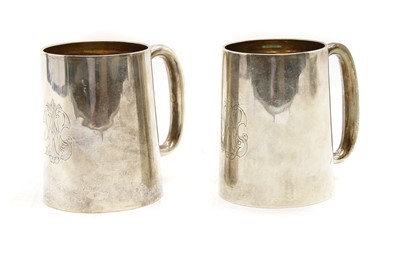 Lot 193 - A matched pair of silver tankards
