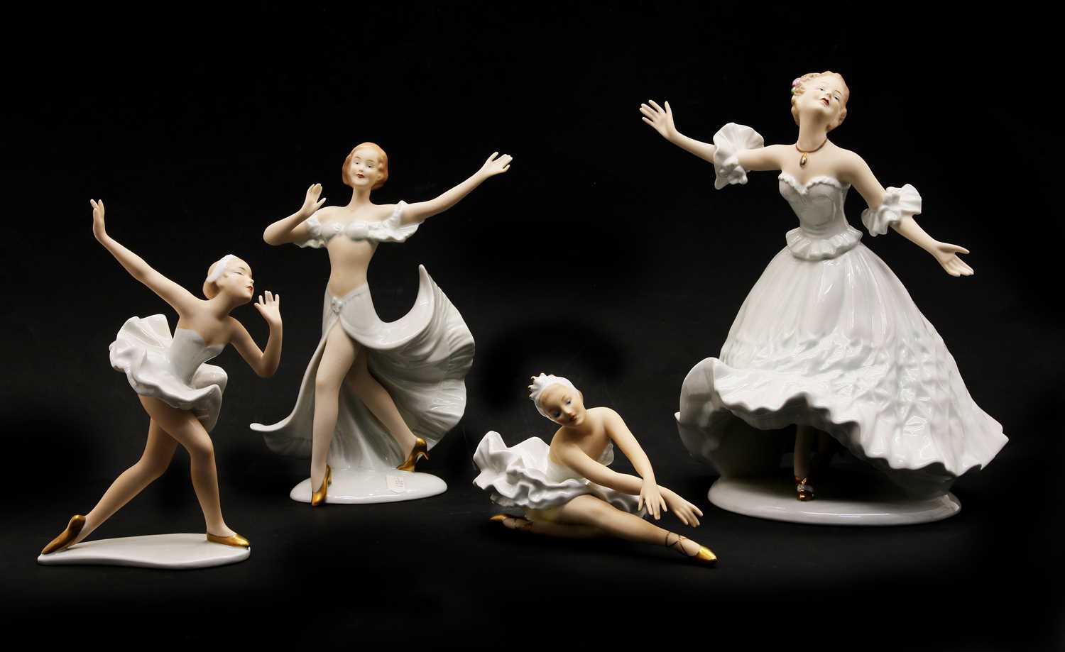 Lot 563 - A collection of German Wallendorf porcelain figures