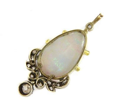 Lot 9 - A gold and silver, opal and diamond pendant