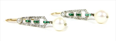 Lot 16 - A pair of platinum and gold, diamond, emerald and pearl drop earrings
