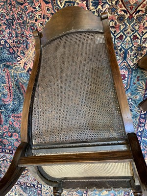 Lot 193 - An Anglo-Indian padouk bergère open armchair